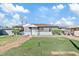 Charming single-story home with a well-maintained front yard and cozy curb appeal at 724 S Lewis --, Mesa, AZ 85210
