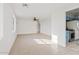 Bright living room with tile floors, neutral walls and ceiling fan at 724 S Lewis --, Mesa, AZ 85210