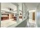 Kitchen featuring hardwood cabinets, an island, and bright, neutral walls at 7548 E Minnezona Ave, Scottsdale, AZ 85251