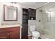 Well-appointed bathroom with granite countertop, ample storage, and glass-enclosed shower at 8155 E Roosevelt St # 112, Scottsdale, AZ 85257