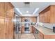 Updated kitchen with stainless steel appliances and granite countertops at 8155 E Roosevelt St # 112, Scottsdale, AZ 85257