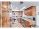 Kitchen with stainless steel appliances and granite countertops at 8155 E Roosevelt St # 112, Scottsdale, AZ 85257
