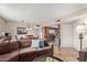 Open living room with sofa, dining area, and kitchen views at 8155 E Roosevelt St # 112, Scottsdale, AZ 85257