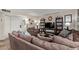 Cozy living room with a comfortable sofa, TV, and lots of light at 8155 E Roosevelt St # 112, Scottsdale, AZ 85257