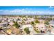 Scenic aerial view of a suburban neighborhood featuring well-maintained homes and tree-lined streets at 8812 N 67Th Dr, Peoria, AZ 85345