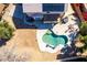 A private backyard features a swimming pool, hot tub, and patio area, perfect for outdoor entertaining at 8812 N 67Th Dr, Peoria, AZ 85345