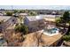Backyard features a refreshing swimming pool, shaded patio, and lush landscaping, creating a relaxing outdoor oasis at 8812 N 67Th Dr, Peoria, AZ 85345