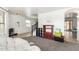 Open-concept area with tiled floor and comfortable seating at 8812 N 67Th Dr, Peoria, AZ 85345