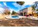 A sparkling pool with a large patio offers an excellent outdoor entertaining space at this two-story home at 8812 N 67Th Dr, Peoria, AZ 85345