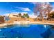 A sparkling pool offers loads of fun for the whole Gathering along with space for lounge chairs at 8812 N 67Th Dr, Peoria, AZ 85345