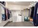 Walk-in closet includes shelving, clothing racks and dresser creating storage and organization at 8812 N 67Th Dr, Peoria, AZ 85345