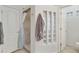 Modern bathroom with glass blocked window, shower with tan tile, and access to the toilet at 9065 E Gary Rd # 121, Scottsdale, AZ 85260