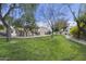 Lush community green space featuring mature trees, well-maintained lawn, and desert-style architecture at 9065 E Gary Rd # 121, Scottsdale, AZ 85260