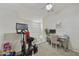 Flex room with a ceiling fan, neutral carpet, and home exercise equipment at 9065 E Gary Rd # 121, Scottsdale, AZ 85260