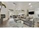Comfortable living room boasts a fireplace, sliding glass door, and stylish furnishings at 9065 E Gary Rd # 121, Scottsdale, AZ 85260