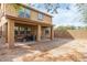 Spacious backyard featuring a covered patio, perfect for entertaining guests outdoors at 9080 W Myrtle Ave, Glendale, AZ 85305