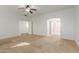Large bedroom with ceiling fan and bathroom access at 9237 W Alex Ave, Peoria, AZ 85382