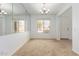 Dining room featuring neutral walls and a large window at 9237 W Alex Ave, Peoria, AZ 85382