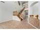 Grand foyer featuring a staircase and tile flooring at 9237 W Alex Ave, Peoria, AZ 85382