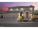 Charming two-story home with a three car garage and desert landscaping at 9237 W Alex Ave, Peoria, AZ 85382