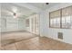 Bright living room with a ceiling fan and sliding glass door at 9237 W Alex Ave, Peoria, AZ 85382