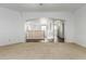 Spacious living room with arched entrance to the upper level at 9237 W Alex Ave, Peoria, AZ 85382