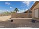 Backyard space with paver patio and desert landscaping at 9734 S 182Nd Dr, Goodyear, AZ 85338