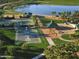 Aerial view of the community amenities with tennis courts, basketball, and picnic areas at 9734 S 182Nd Dr, Goodyear, AZ 85338