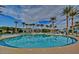 Large community pool complex featuring multiple pools, a waterslide, and ample lounge areas at 9734 S 182Nd Dr, Goodyear, AZ 85338