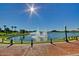 Stunning waterfront community with a tranquil lake and fountain features, perfect for relaxation at 9734 S 182Nd Dr, Goodyear, AZ 85338