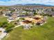 Enjoy the community park with covered picnic areas, playgrounds, and lush green spaces near residential homes at 9734 S 182Nd Dr, Goodyear, AZ 85338