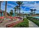 Relaxing outdoor patio area with comfortable seating near the community pool and water features at 9734 S 182Nd Dr, Goodyear, AZ 85338