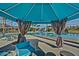Inviting cabana with comfortable seating and a view of the community pool area at 9734 S 182Nd Dr, Goodyear, AZ 85338