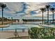 Community pool with a fountain and poolside seating, perfect for relaxation and recreation at 9734 S 182Nd Dr, Goodyear, AZ 85338