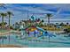 Vibrant waterslide feature in the community pool area, perfect for Gathering entertainment and recreation at 9734 S 182Nd Dr, Goodyear, AZ 85338