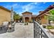 Charming courtyard with comfortable seating and a beautiful water fountain feature at 10798 E Hedgehog Pl, Scottsdale, AZ 85262