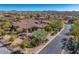 Expansive desert home is on a cul-de-sac and features lush landscaping at 10798 E Hedgehog Pl, Scottsdale, AZ 85262