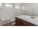 Bathroom featuring tile flooring, a combined shower and tub, and a modern vanity at 1187 E Ridgerock St, Casa Grande, AZ 85122