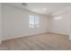 Bedroom featuring fresh paint, neutral carpet, and ample natural light at 1187 E Ridgerock St, Casa Grande, AZ 85122