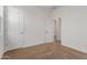 Bedroom with neutral carpet and a glimpse into the home's hallway at 1187 E Ridgerock St, Casa Grande, AZ 85122