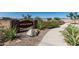 Arroyo Grande community sign surrounded by lush desert landscaping and manicured grounds at 1187 E Ridgerock St, Casa Grande, AZ 85122