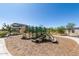 Community playground featuring slides, climbing structures, and a safe play area at 1187 E Ridgerock St, Casa Grande, AZ 85122