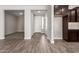 Inviting entryway with stylish flooring, neutral paint, and ample natural light, leading to the home's living spaces at 1191 E Ridgerock St, Casa Grande, AZ 85122