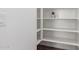 Bright pantry featuring white shelves at 13242 W Hackamore Dr, Peoria, AZ 85383