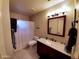 Bathroom with shower, vanity and tub with shower curtain at 14009 N 30Th St, Phoenix, AZ 85032