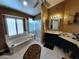 Bright bathroom with tub, separate shower, vanity and lots of natural light at 14009 N 30Th St, Phoenix, AZ 85032