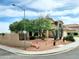 Charming two-story home with a red tile roof and desert landscaping on a corner lot at 14009 N 30Th St, Phoenix, AZ 85032