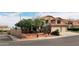 Charming two-story home with a red tile roof and desert landscaping on a corner lot at 14009 N 30Th St, Phoenix, AZ 85032