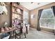 Home office features a unique rustic wood desk and plenty of natural light through a large window at 14250 W Wigwam Blvd # 1326, Litchfield Park, AZ 85340