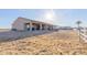 View of the home and extended covered patio area from the large backyard and horse property at 1444 W Gail Rd, San Tan Valley, AZ 85144